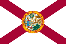 A flag of florida with the state seal on it.